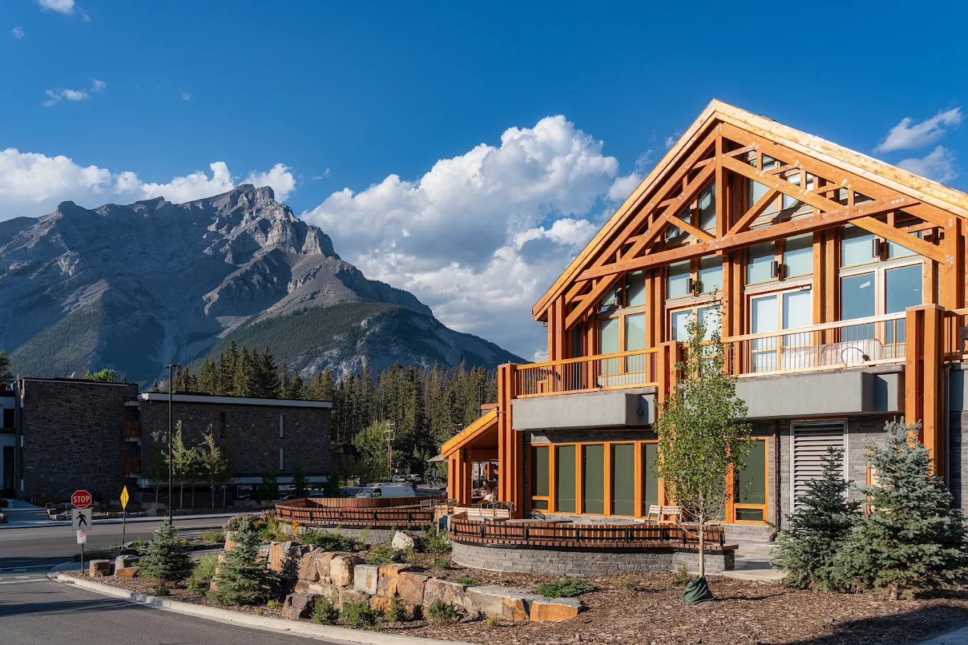 Otter Hotel exterior with mountain backdrop, Banff Avenue